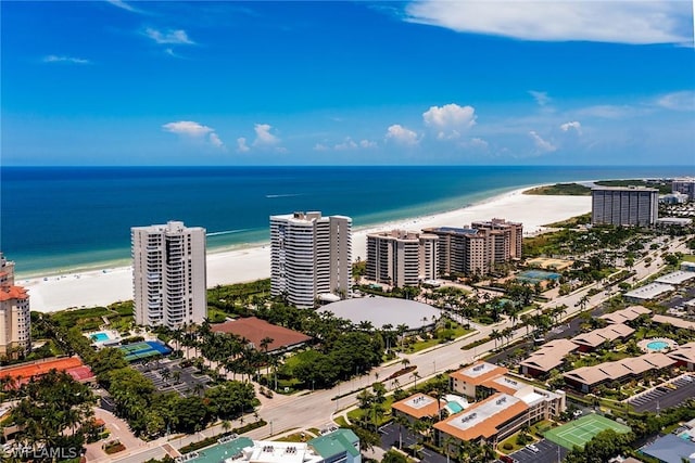 drone / aerial view with a view of the beach and a water view