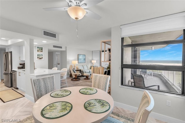 dining room featuring ceiling fan