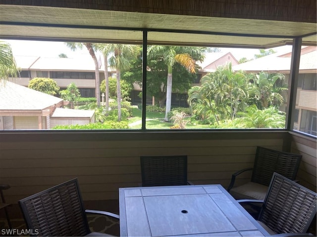 64 4th St Unit B201, Bonita Springs, FL 34134 - dining room with plenty of natural light