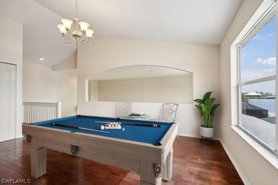 playroom with plenty of natural light, pool table, dark hardwood / wood-style flooring, and vaulted ceiling