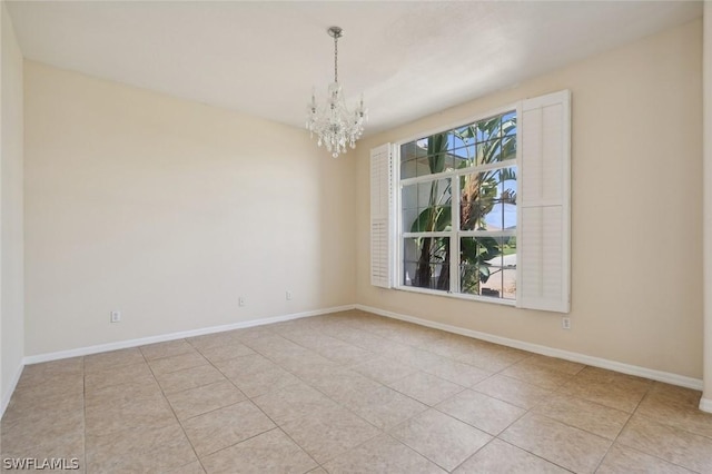 unfurnished room featuring light tile patterned floors and a chandelier