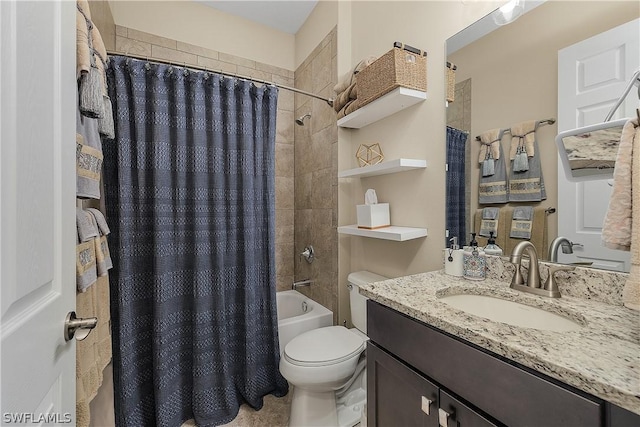 full bathroom with vanity, shower / tub combo, and toilet