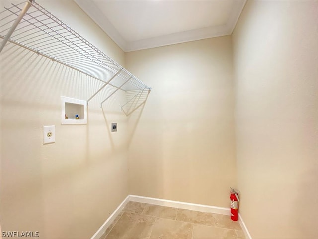 washroom featuring hookup for an electric dryer, hookup for a washing machine, and ornamental molding