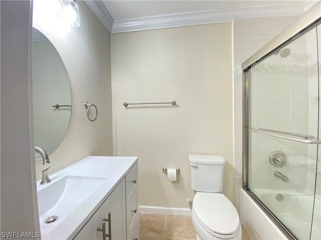 full bathroom featuring toilet, tile patterned floors, bath / shower combo with glass door, vanity, and ornamental molding