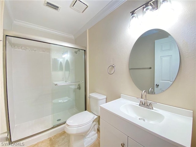 bathroom with vanity, ornamental molding, tile patterned floors, toilet, and walk in shower