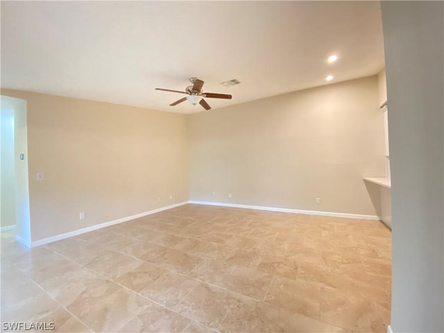 empty room with ceiling fan