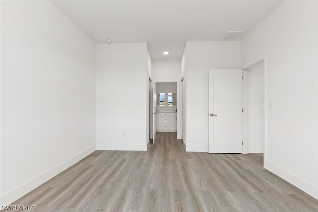 unfurnished bedroom with light hardwood / wood-style flooring