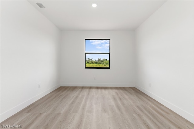 unfurnished room featuring light wood-type flooring