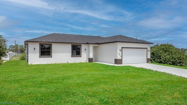 ranch-style home featuring a garage and a front lawn