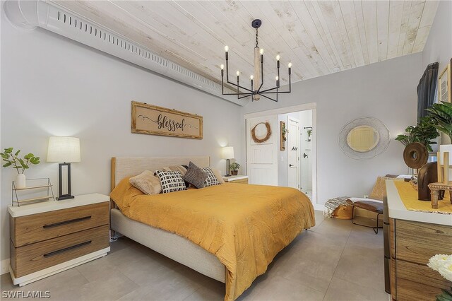 bedroom with ensuite bath, wooden ceiling, and a chandelier