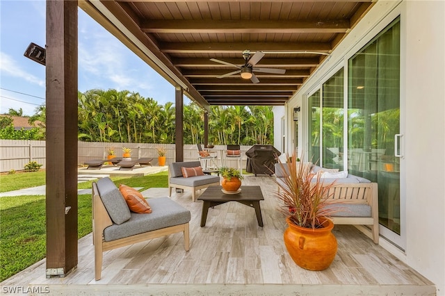 view of patio / terrace featuring grilling area, ceiling fan, and an outdoor hangout area