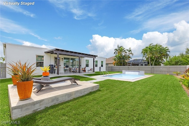 rear view of house with a pergola, a fenced in pool, a patio area, and a lawn