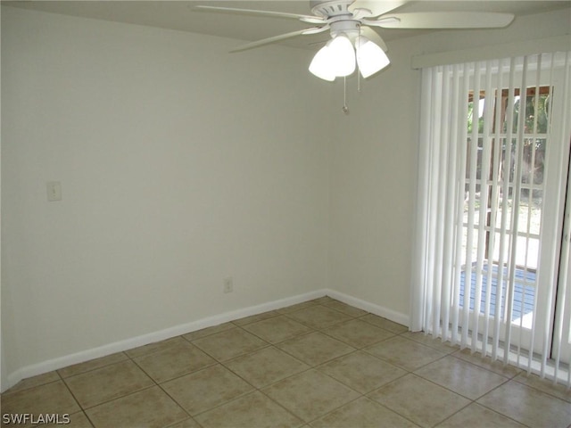 unfurnished room with light tile patterned flooring and ceiling fan