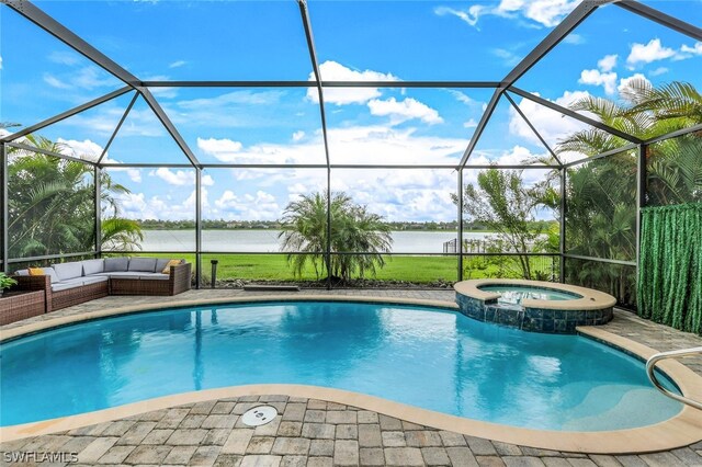 view of swimming pool with glass enclosure, an in ground hot tub, and a water view