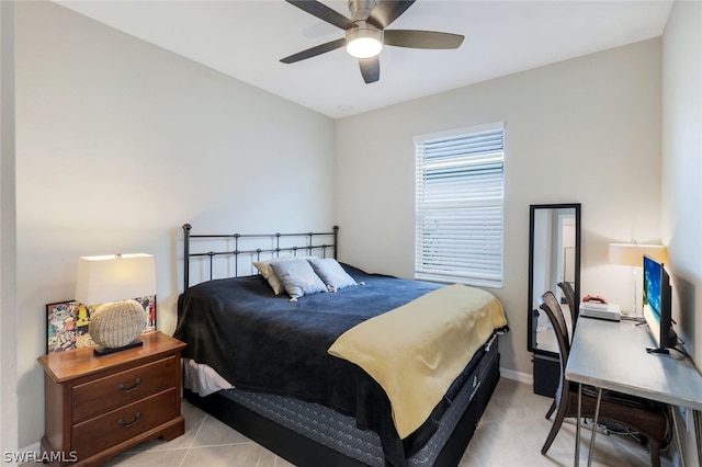 tiled bedroom with ceiling fan