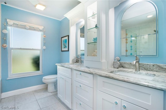 bathroom with vanity, ornamental molding, an enclosed shower, toilet, and tile patterned floors