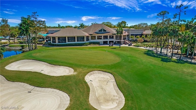 surrounding community featuring a water view