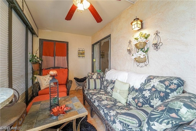 sunroom / solarium with ceiling fan