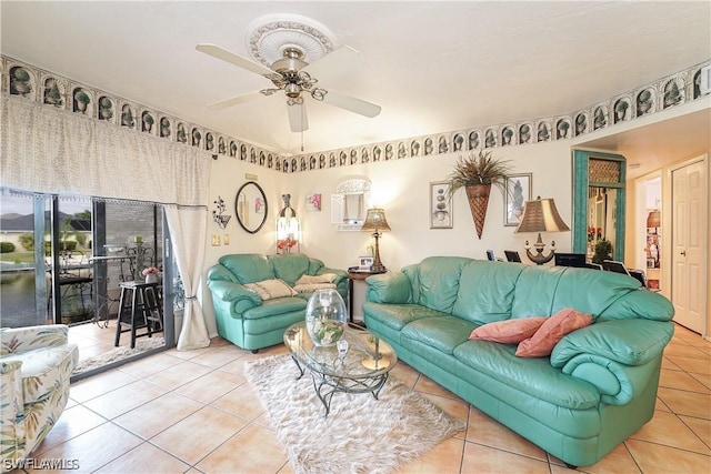 living room featuring ceiling fan and light tile patterned floors