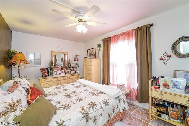 bedroom featuring ceiling fan