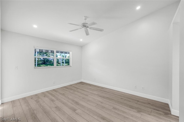 empty room with ceiling fan, recessed lighting, wood finished floors, and baseboards