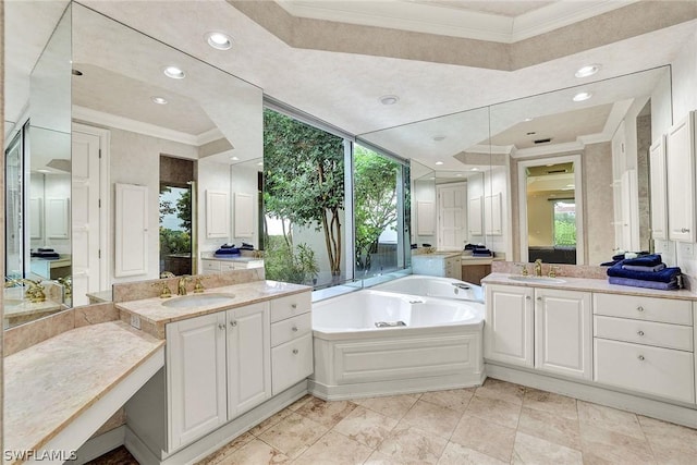 bathroom with vanity, floor to ceiling windows, ornamental molding, and a tub to relax in