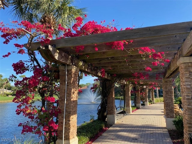 view of property's community with a water view