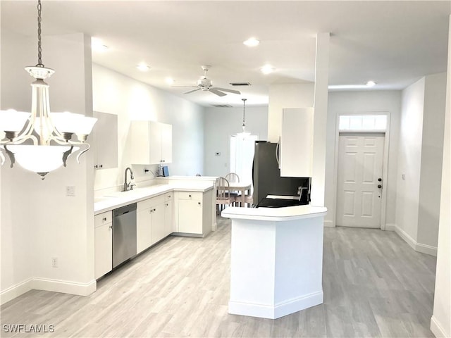 3357 Wildwood Lake Cir, Bonita Springs, FL 34134 - kitchen featuring a peninsula, light wood-style floors, ceiling fan, fridge, and dishwasher