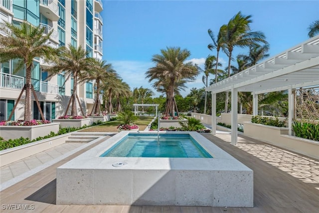 view of swimming pool featuring a pergola