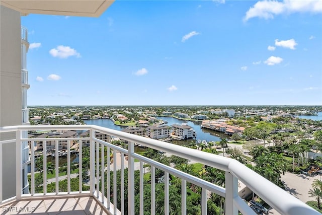 balcony featuring a water view