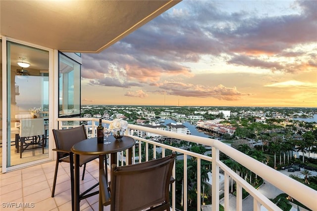 view of balcony at dusk