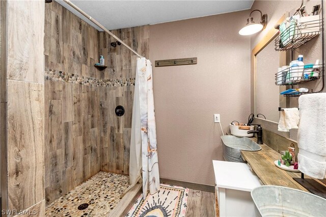 bathroom with vanity and walk in shower