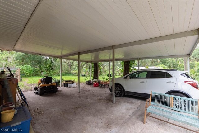 exterior space with a carport