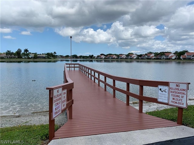 view of dock with a water view