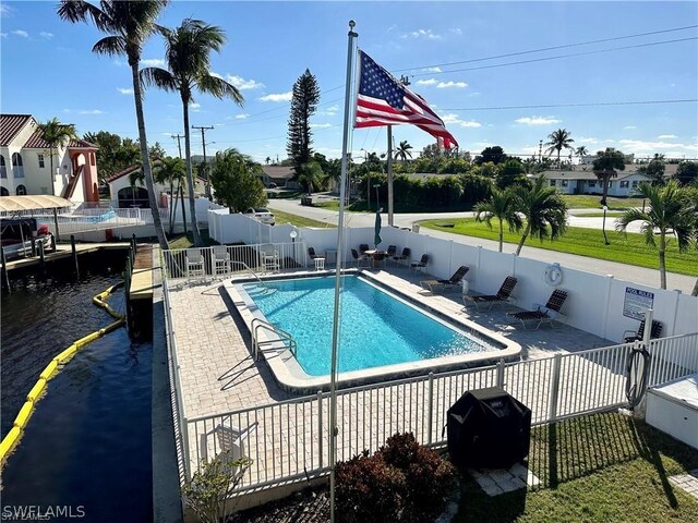 view of swimming pool featuring a patio