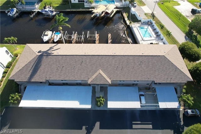 4563 SE 5th Pl Unit 205, Cape Coral, FL 33904 - drone / aerial view featuring a water view