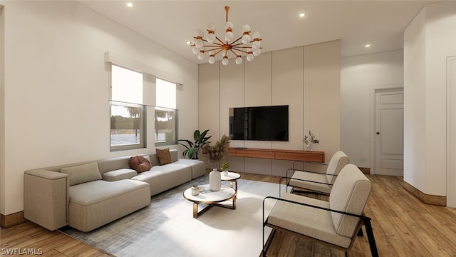 living room with hardwood / wood-style floors and a chandelier