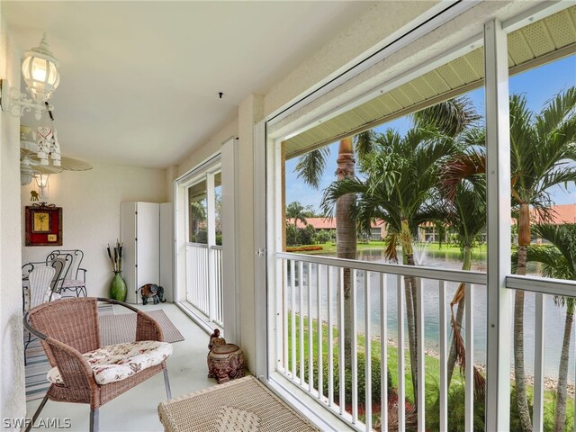 sunroom with a water view