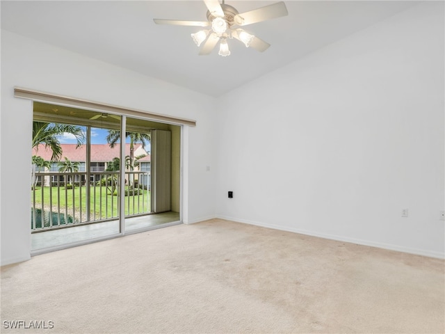 unfurnished room featuring ceiling fan, baseboards, and light colored carpet