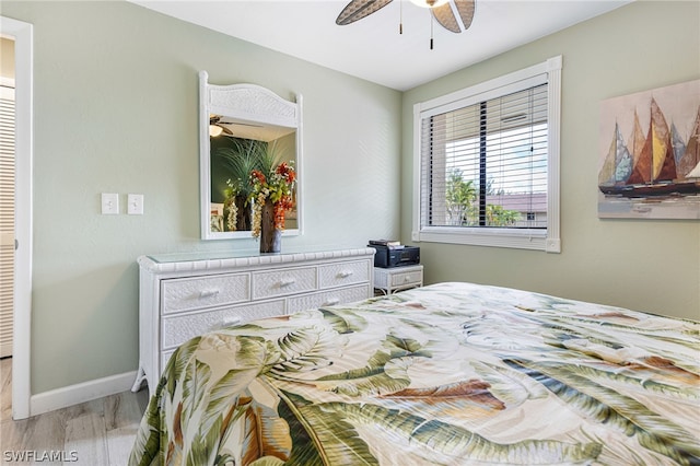 bedroom featuring ceiling fan and light hardwood / wood-style floors