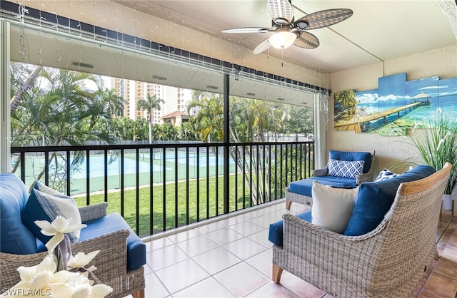 sunroom / solarium with ceiling fan