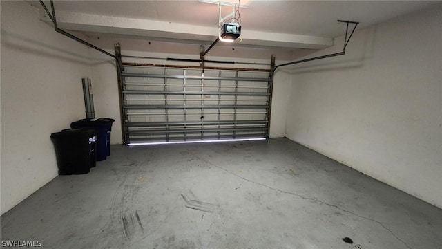 garage featuring a garage door opener