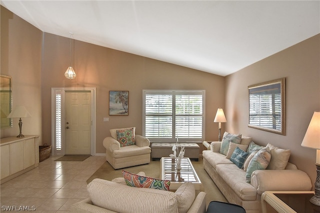 tiled living room with high vaulted ceiling