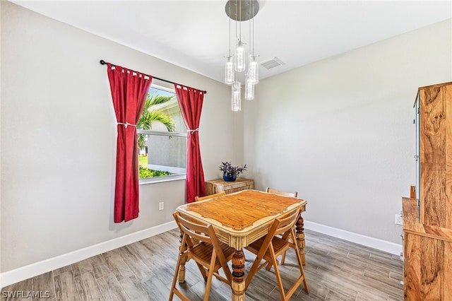 dining room featuring hardwood / wood-style flooring