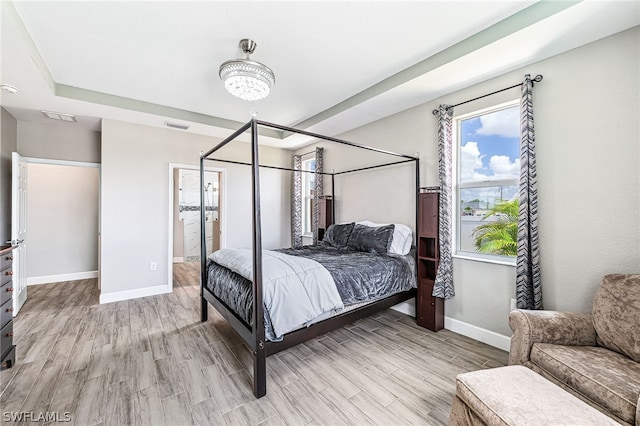 bedroom with light hardwood / wood-style floors