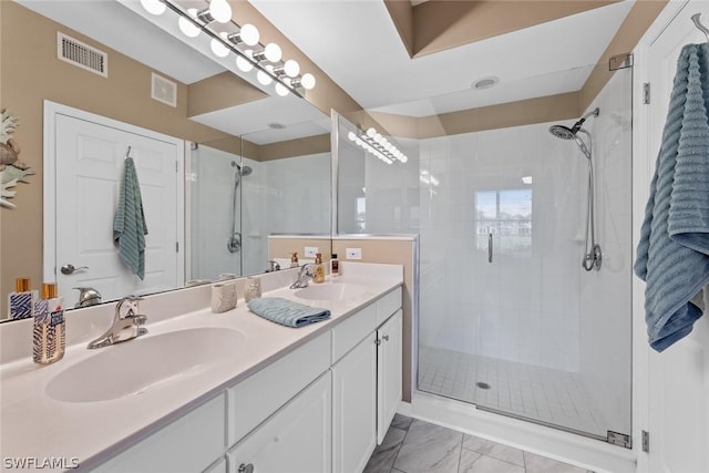 bathroom with vanity and walk in shower