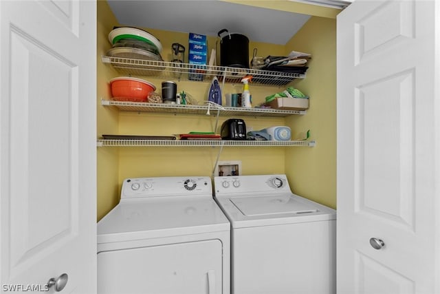 laundry area featuring washing machine and dryer