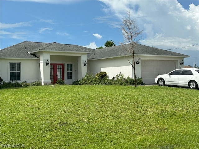 view of property exterior with french doors, a garage, and a lawn