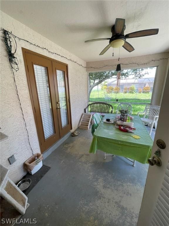 exterior space with french doors and ceiling fan