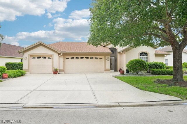 view of front of home with a garage